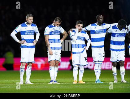 Queens Park Rangers players react after defeat in the penalty shoot-out during the Carabao Cup Fourth Round match at the Kiyan Prince Foundation Stadium, London. Picture date: Tuesday October 26, 2021. Stock Photo