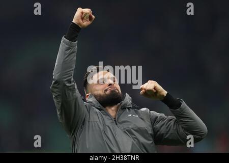 Milan, Italy, 26th October 2021. Olivier Giroud of AC Milan celebrates in front of the fans following the final whistle  of the Serie A match at Giuseppe Meazza, Milan. Picture credit should read: Jonathan Moscrop / Sportimage Stock Photo