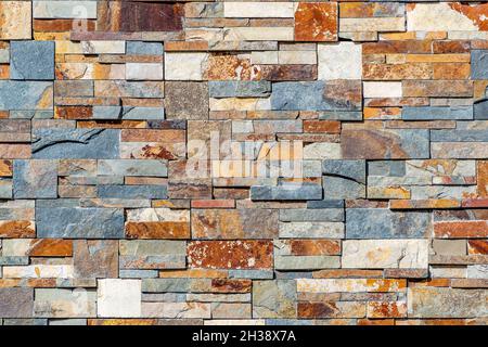Stone wall with textured surface for wallpapers and background. Stock Photo