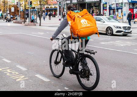 Just Eat delivery rider in Cork, Ireland. Stock Photo