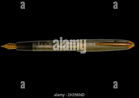 Vintage fountain pen isolated on black. Antique fountain pen on black including clipping path. Copy space Stock Photo