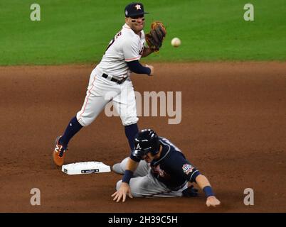 Houston, United States. 26th Oct, 2021. Houston Astros second baseman Jose Altuve throws to first on a fielders choice as Atlanta Braves Adam Duvall is out at second base in the 7th inning of game one in the MLB World Series at Minute Maid Park in Houston, Texas on Tuesday, October 26, 2021. Photo by Maria Lysaker/UPI Credit: UPI/Alamy Live News Stock Photo