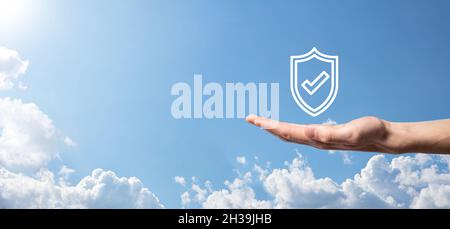 Protection network security computer in the hands of a businessman. business, technology, cyber security and internet concept - businessman pressing s Stock Photo