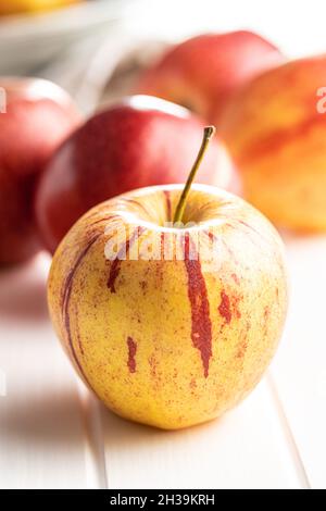 Fresh autumn apples on white table. Stock Photo
