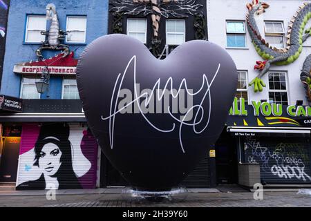 EDITORIAL USE ONLY A 20-foot black heart is unveiled in Camden, London to celebrate 15 years since the release of Amy Winehouse's Back to Black album. Picture date: Wednesday October 27, 2021. Stock Photo