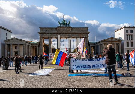 Demonstration - People protesting about bombing in Yemen in front of the Brandenburg Gate,Mitte,Berlin Stock Photo