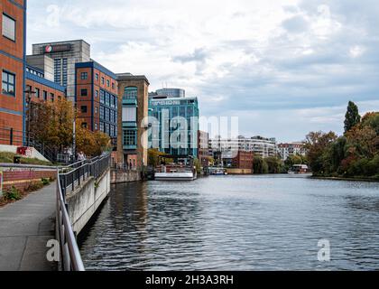 Spree River View, Old grain mill loading tower, modern Focus Teleport building,Abion Hotel, moored Seminar boat, Spreebogen, Alt-Moabit Berlin,Germany Stock Photo