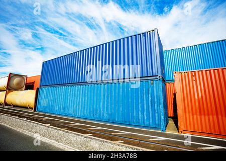Containers of different types in the port Stock Photo