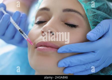 Female patient lay with closed eyes Stock Photo