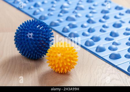 massage rubber balls, mat for self massage and reflexology