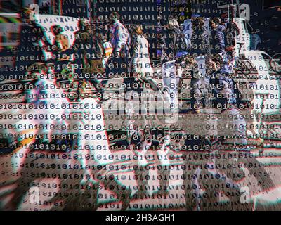 Multiple exposures of Commuters on their way to work, Waterloo Station, Binary code overlay Stock Photo