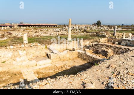 Ruins of the Sanctuary of Artemis in Magnesia on the Maeander ancient site in Aydin province of Turkey. The building dates from 4th century BC – 13th Stock Photo