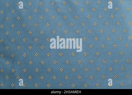 light blue fabric with golden geometric shapes texture Stock Photo