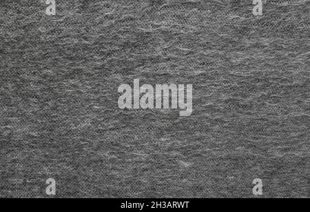 Texture of gray woolen fabric. Stock Photo
