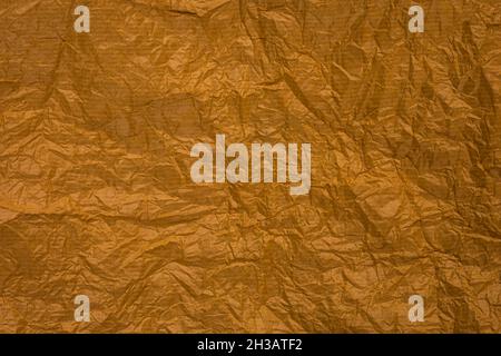crumpled paper, light brown tone background texture or abstract, space for text Stock Photo