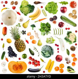Corn, bananas and carrots, pumpkin, zucchini and pineapple scattered isolated on white background Stock Photo