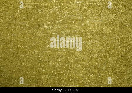 the texture of the scratched shining golden surface background Stock Photo