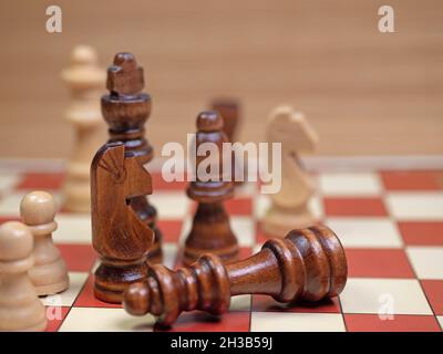 Chess pieces on a game board in close-up Stock Photo
