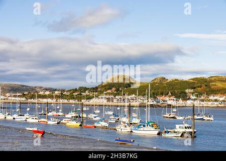 Small boats anchored in the River Conwy estuary, Conwy, Glwyd,  Wales. Stock Photo