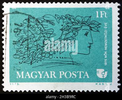 HUNGARY - CIRCA 1975: a stamp printed in Hungary dedicated to International Women’s Year 1975, circa 1975 Stock Photo