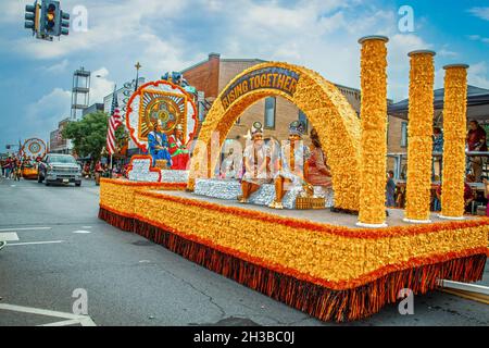 2019 08 31 Tahlequah OK Native American Cherokee  float in mainstreet parade with Indian pricnesses and Rising Together sign Stock Photo