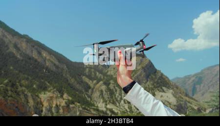 A drone in the hand of a man Stock Photo