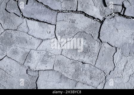 Crack on the wall. Broken concrete slab. Ruins after the crash. Stock Photo