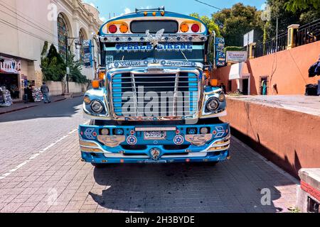 Traditional chicken bus, Antigua, Guatemala Stock Photo