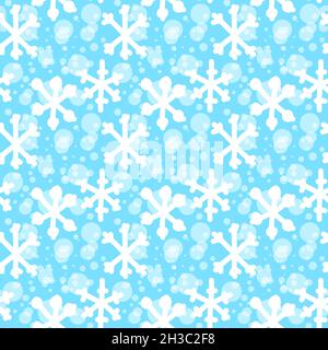 A tiling, seamless background of white snowflakes on a blue background Stock Photo