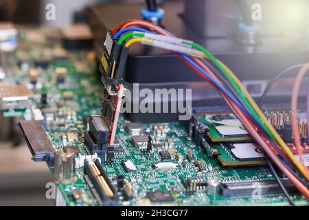 Electronic circuit board chips processor. Green PCB Component. Stock Photo