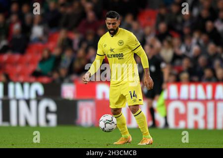 Stoke On Trent, UK. 27th Oct, 2021. Saman Ghoddos #14 of Brentford controls the ball in Stoke-on-Trent, United Kingdom on 10/27/2021. (Photo by Simon Whitehead/News Images/Sipa USA) Credit: Sipa USA/Alamy Live News Stock Photo