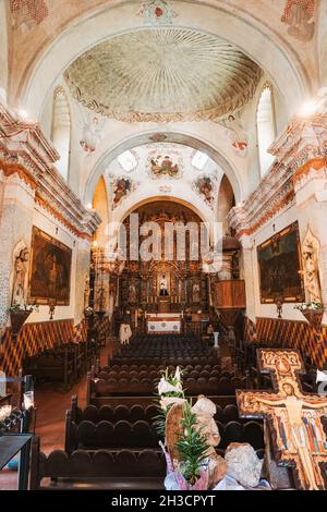The interior of the San Xavier del Bac Mission, built in 1797 on the outskirts of what is now Tucson, AZ Stock Photo