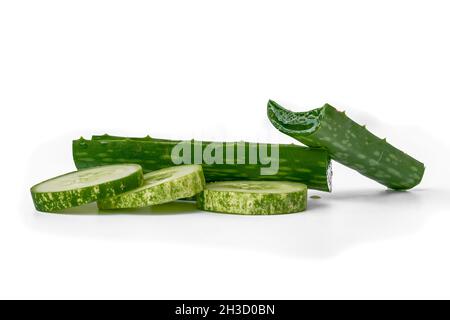 Three slices of cucumber for salad, have composition stacked, isolated on white background, copy space Stock Photo
