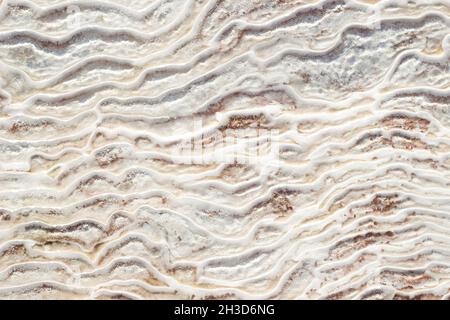 Background textural of asymmetric drawing. Natural texture of travertine Pamukkale. Close-up Stock Photo