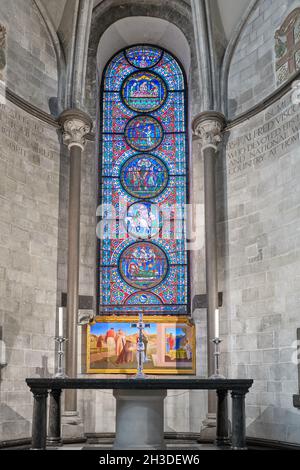 Stained glass window and altar in the chapel of St Martin at Canterbury cathedral, England. Stock Photo