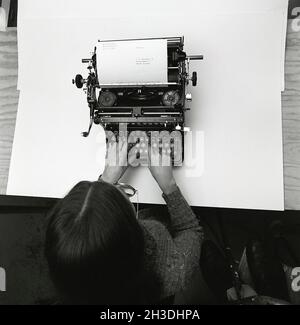 The typewriter. Here a manual variant, not electric. The keys of each letter is connected to an arm, and when pressed hits the sheet of paper with a carbon ribbon between, making the printed letter black. Every movement was made by hand as for example making a new row. When reaching the end of the row, a pling was heard to inform that you only could type a few more letters.  Sweden 1971. Photo Kristoffersson ED44-4 Stock Photo