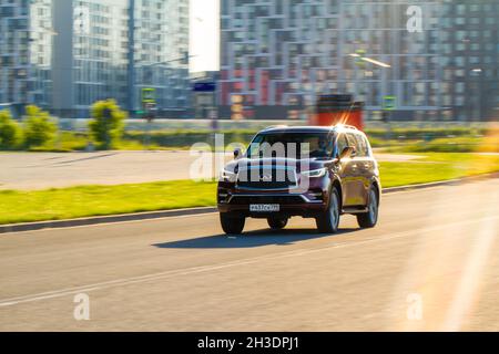 MOSCOW, RUSSIA - JUNE 20, 2021 Infiniti QX80 model year 2021 also called Infiniti QX56 in motiom. A full-size luxury SUV. Stock Photo