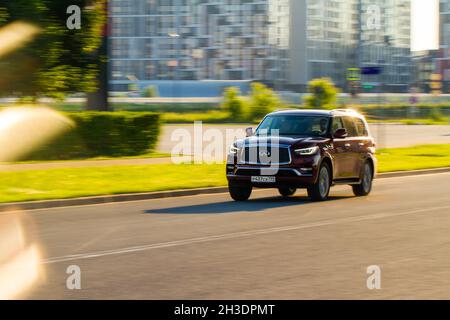 MOSCOW, RUSSIA - JUNE 20, 2021 Infiniti QX80 model year 2021 also called Infiniti QX56 in motiom. A full-size luxury SUV. Stock Photo