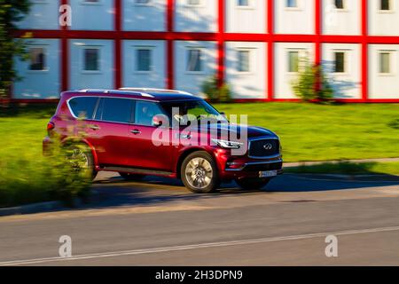 MOSCOW, RUSSIA - JUNE 20, 2021 Infiniti QX80 model year 2021 also called Infiniti QX56 in motiom. A full-size luxury SUV. Stock Photo