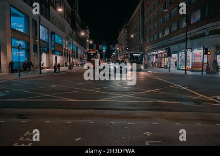 The Number 74 Bus on Oxford Street, London UK, at night. Stock Photo