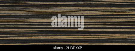 Wood grain texture. Ebony wood, can be used as background. Stock Photo