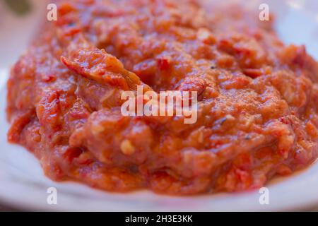 'Salata de ardei copti', typical Romanian salad of Roasted red bell peppers, Stock Photo