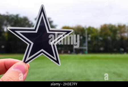 Cleveland Browns professional american football club, silhouette of NFL  trophy, logo of the club in background Stock Photo - Alamy