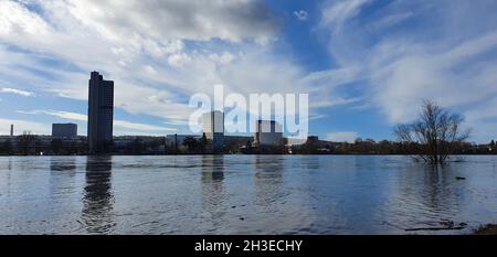 Bonn Germany February 2021 the Rhine and the skyline Bonn at high water in beautiful weather with blue sky Stock Photo