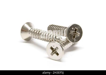 Macro Metal screws photo. isolated on white background Stock Photo