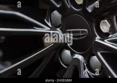 MOSCOW, RUSSIA - JUNE 14, 2021 Geely company logo close-up view on the wheel. Logo of the Chinese multinational automotive company manufacturer Geely Stock Photo