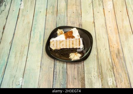 Latin American tres leches cake consisting of a sponge cake bathed in three types of milk: evaporated milk, heavy cream and condensed milk Stock Photo