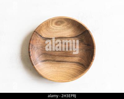 Round wooden craft plate mockup for eco, food or beauty product on white background. Top view. Copy space Stock Photo