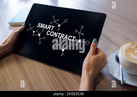 Smart contract blockchain based technology concept on screen. Cryptocurrency, Bitcoin and ethereum. Stock Photo