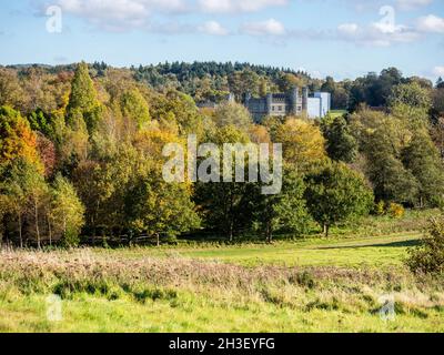 Maidstone, Kent, UK. 28th Oct, 2021. UK Weather: a sunny afternoon with vivid autumn colours at Leeds Castle in Kent. The castle has been partially wrapped in preparation for the annual fireworks display.  Credit: James Bell/Alamy Live News Stock Photo